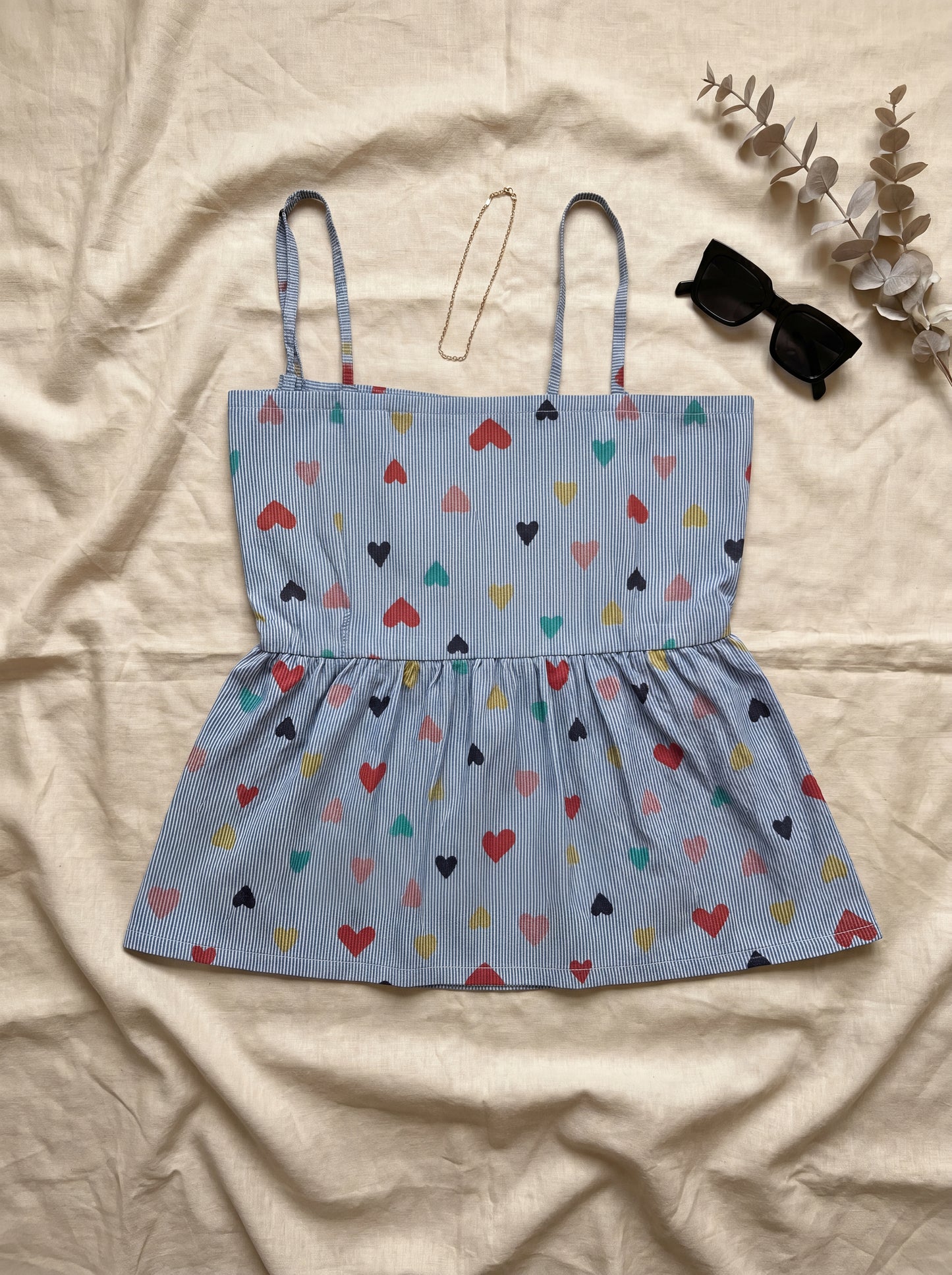 All Eyes on Bow Top flatlay front