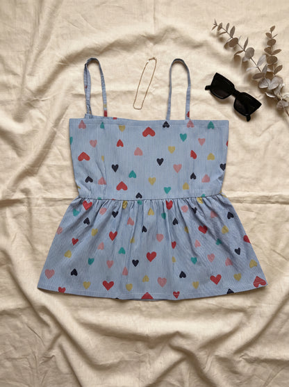 All Eyes on Bow Top flatlay front