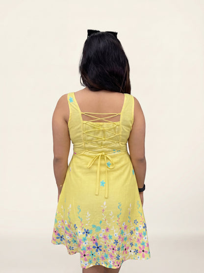 Flora Sun Short Dress lace-up back on model